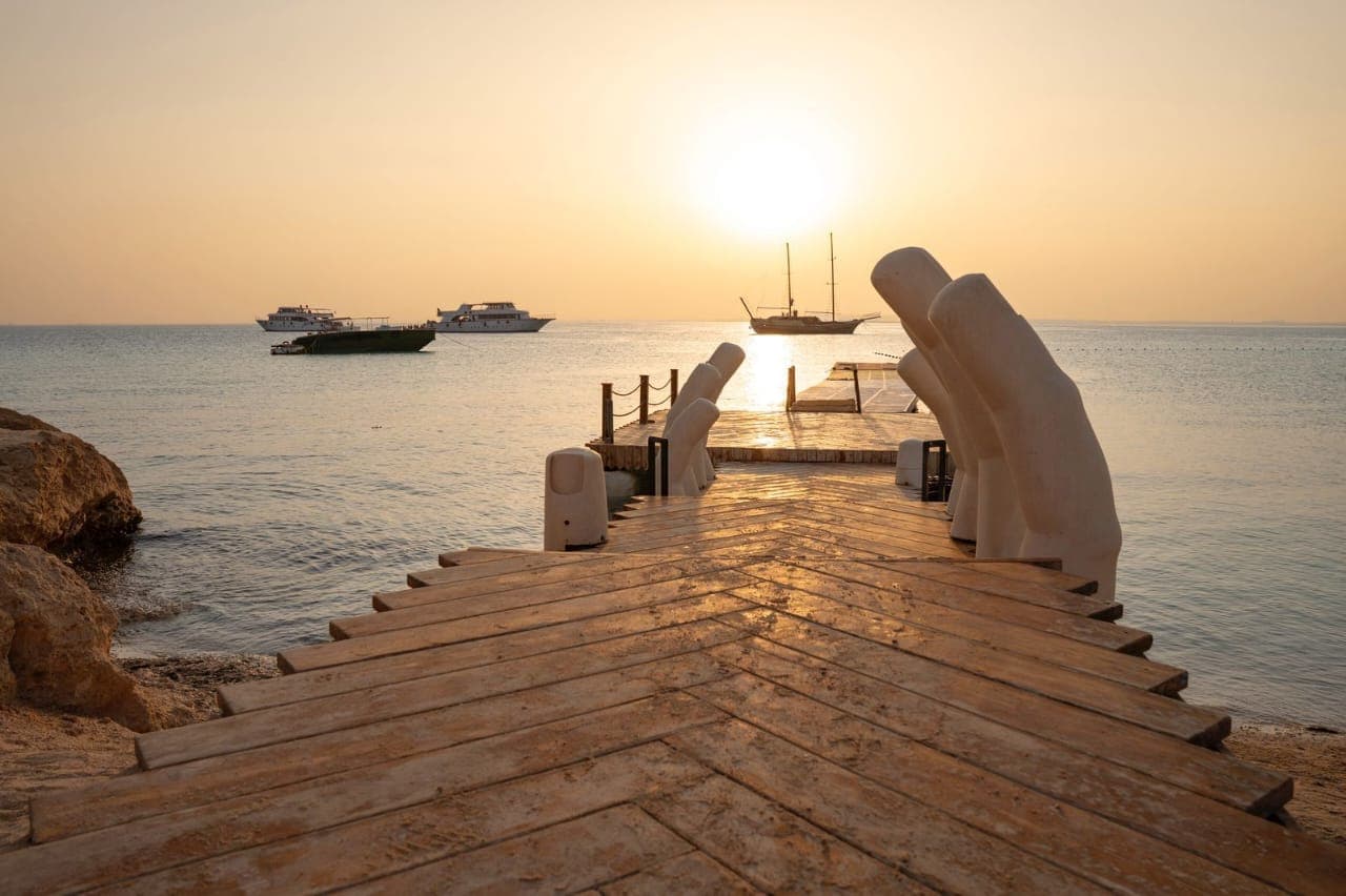 Wooden jetty at sunset on Ozirea Island